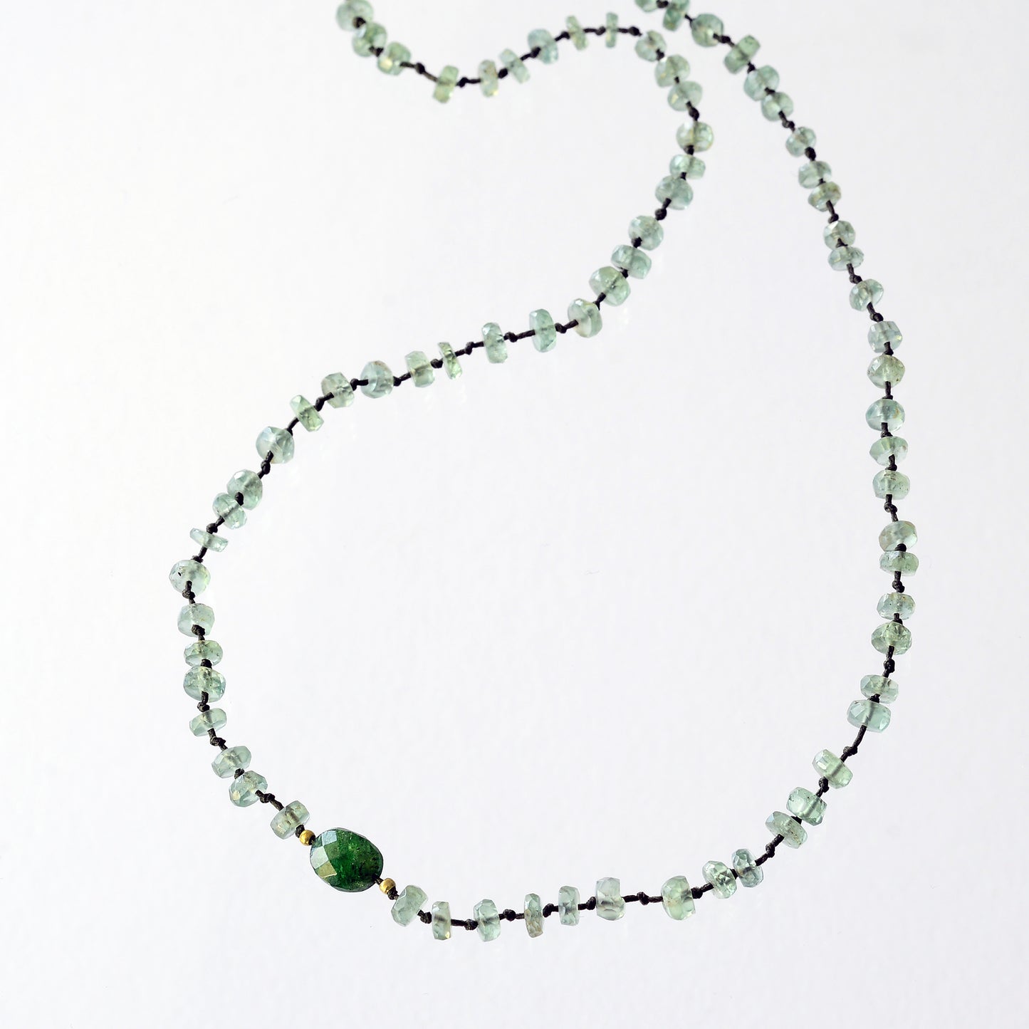 Full mint kyanite necklace and 1 oval travorite