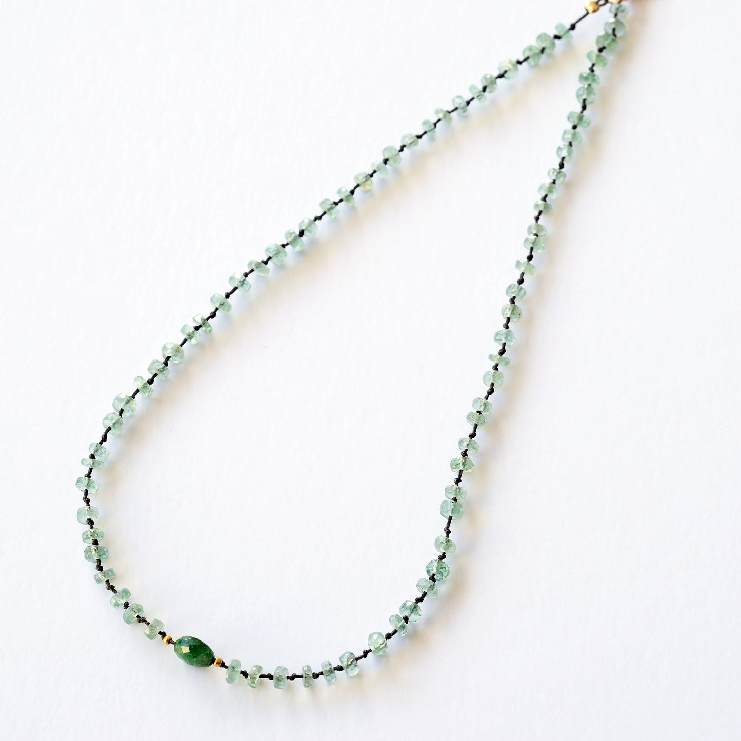 Full mint kyanite necklace and 1 oval travorite