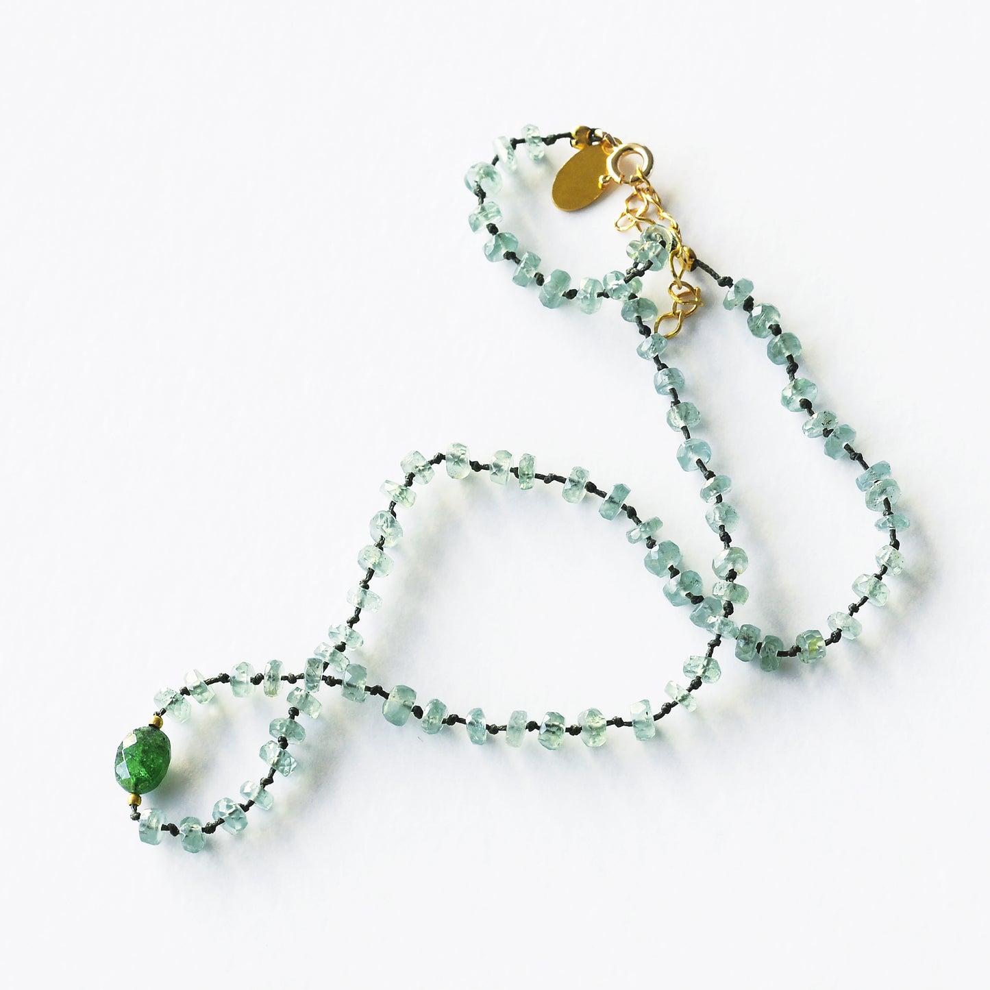 Full mint kyanite necklace and 1 oval travorite