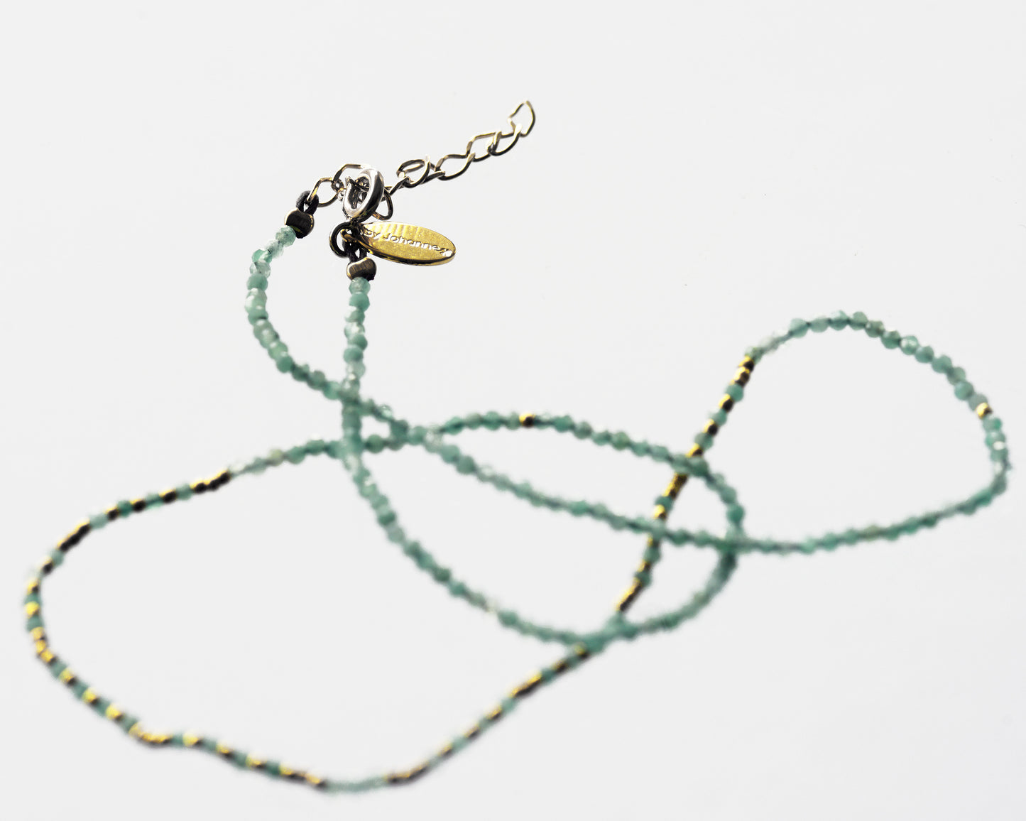 Emerald necklace and mini golden pearls