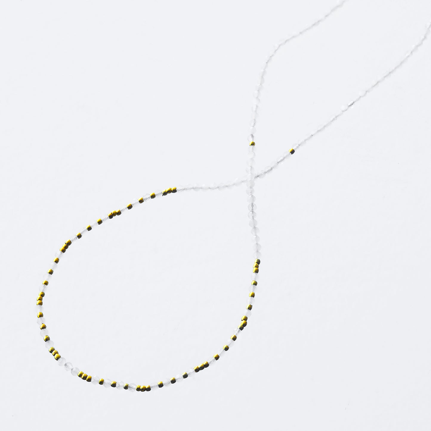 White moon stone necklace and mini golden pearls