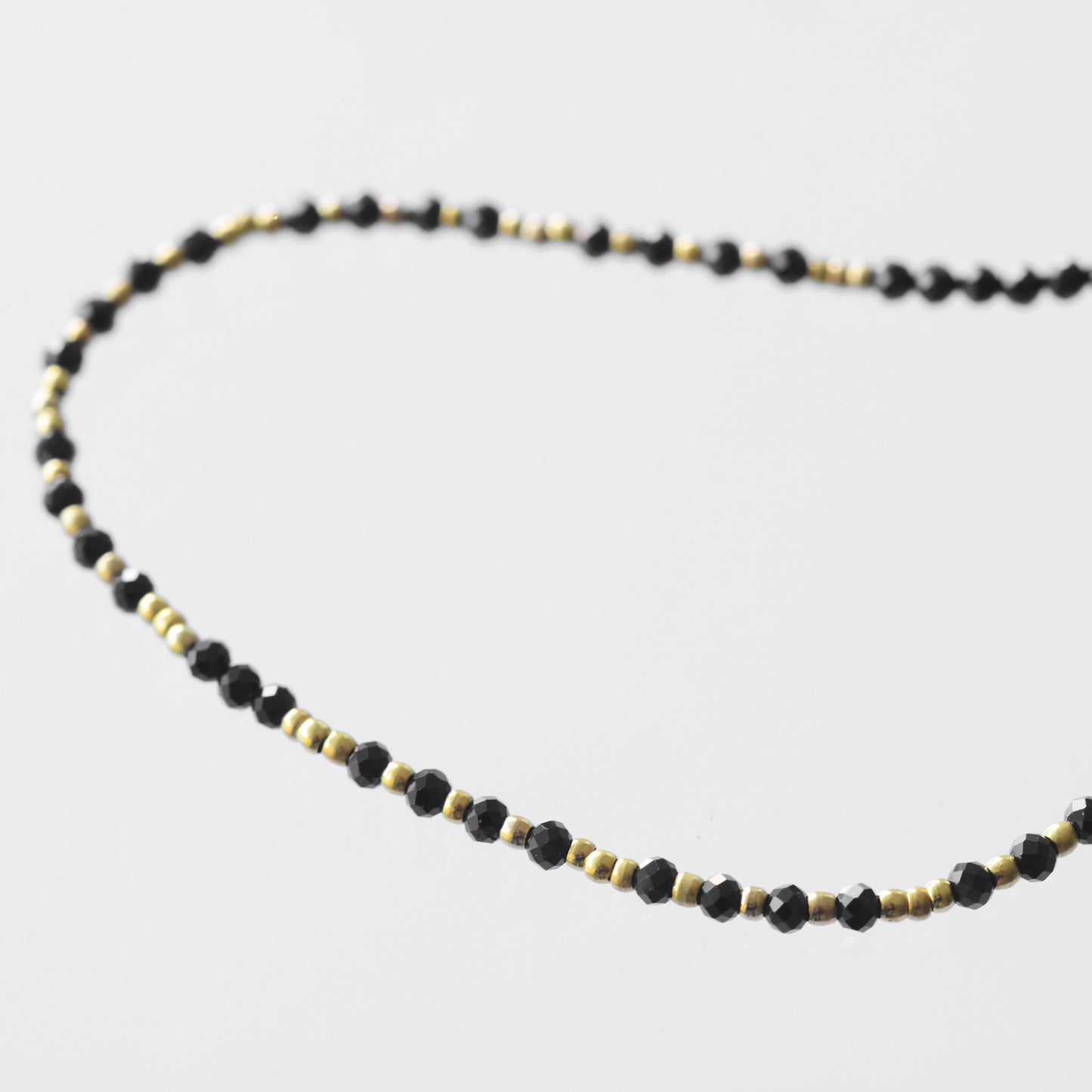 Black spinel necklace and mini golden pearls